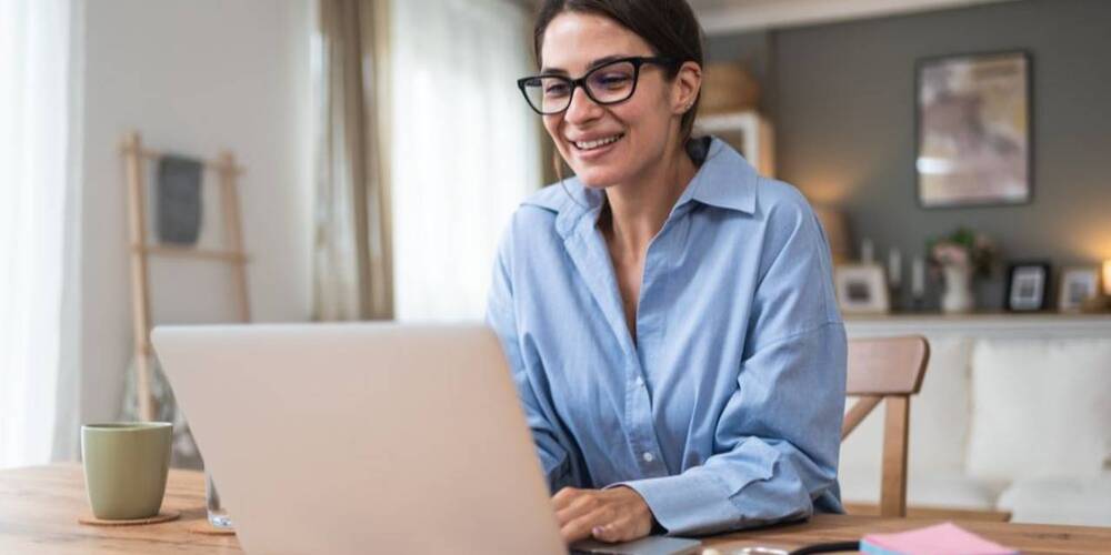 woman looking at laptop