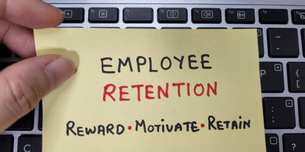 Employee Retention written on Yellow paper